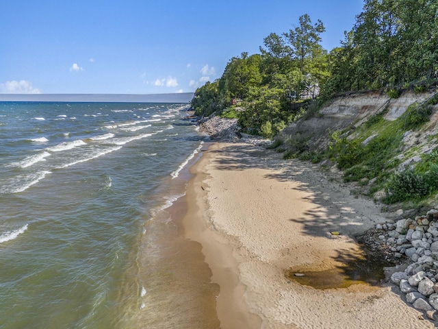 view of water feature with a beach view