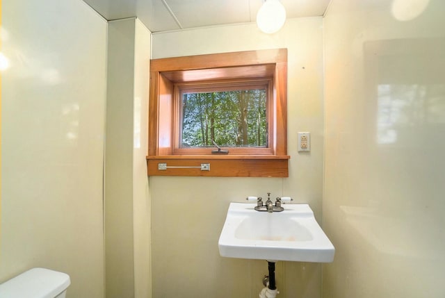 bathroom with toilet and sink