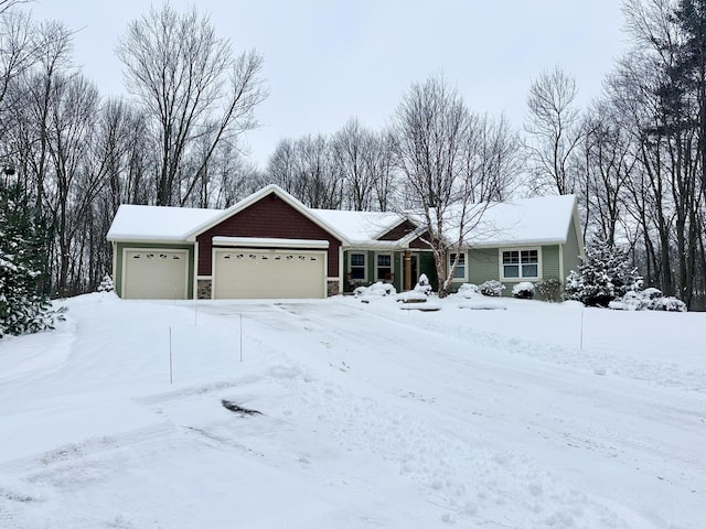 single story home with a garage