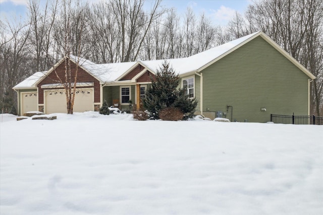 single story home featuring a garage