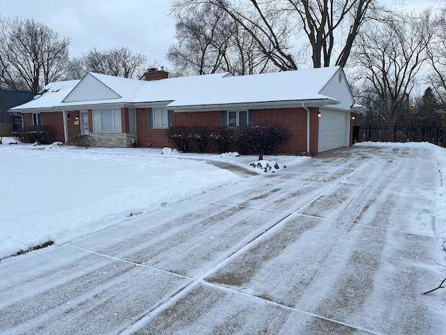 single story home with a garage