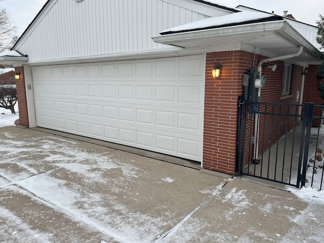 view of snow covered garage