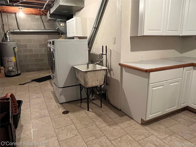 43 W Breitmeyer, Mount Clemens, MI 48043 - laundry room with cabinet space, gas water heater, concrete block wall, and separate washer and dryer