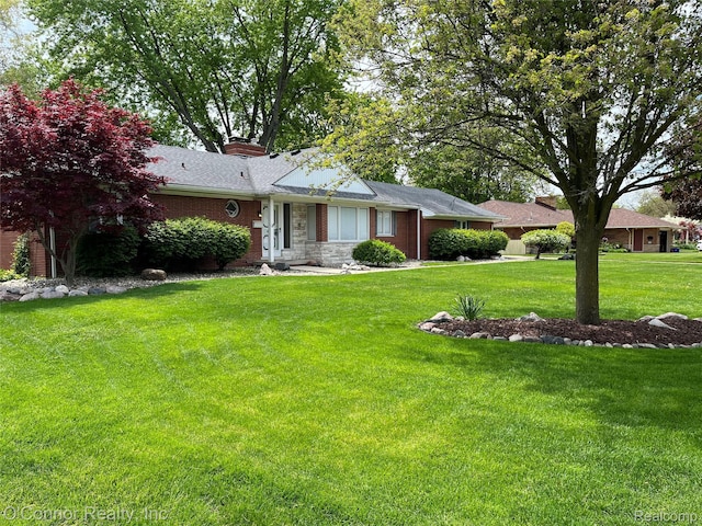 43 W Breitmeyer, Mount Clemens, MI 48043 - ranch-style house with a front yard and stone siding