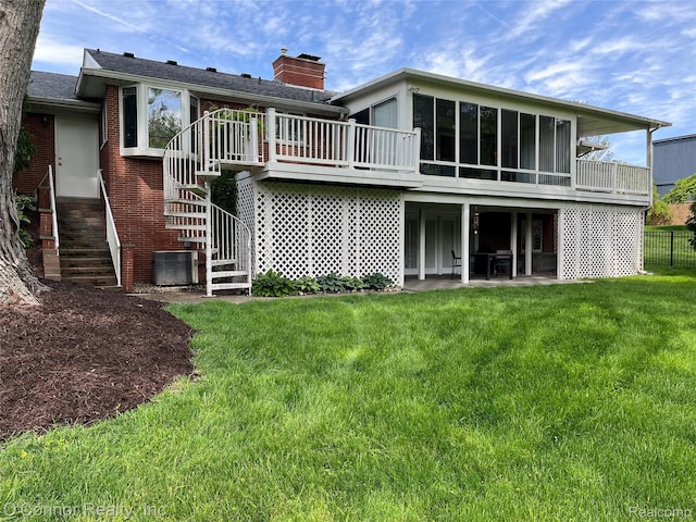 43 W Breitmeyer, Mount Clemens, MI 48043 - rear view of property with stairs, central AC unit, a sunroom, a chimney, and a wooden deck