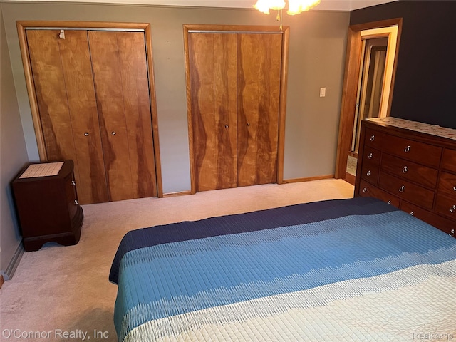 43 W Breitmeyer, Mount Clemens, MI 48043 - carpeted bedroom featuring two closets and baseboards