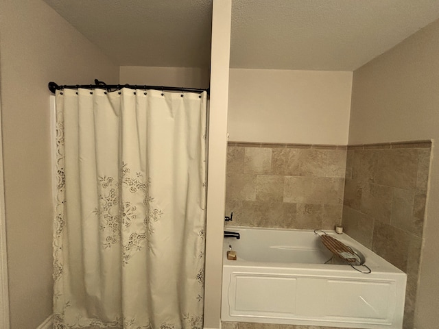 bathroom with tile walls and a tub