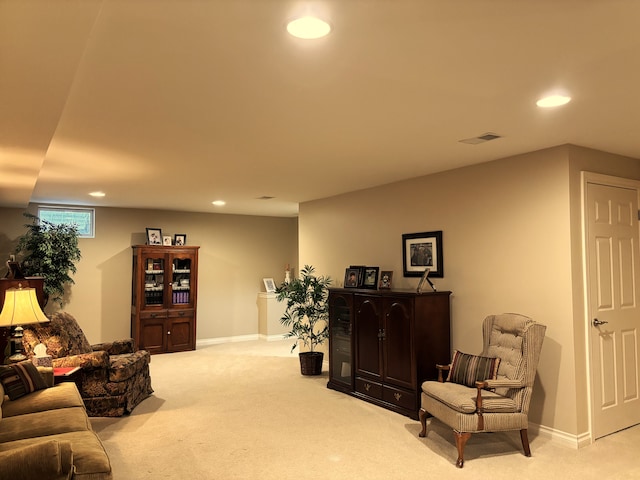 living room with light colored carpet