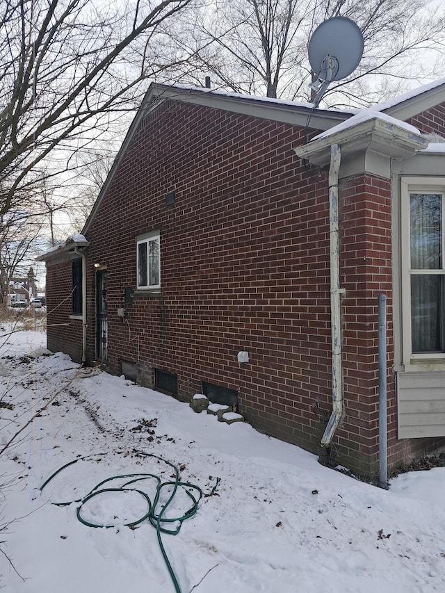 view of snow covered property