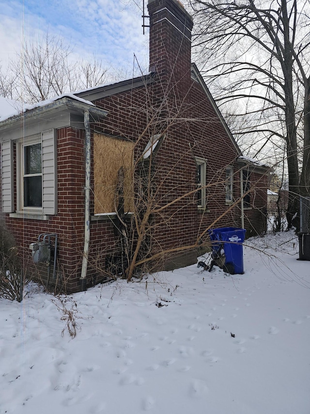 view of snow covered property