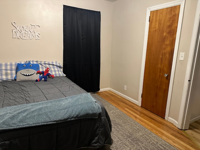 bedroom featuring hardwood / wood-style flooring