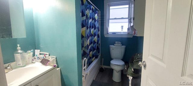 full bathroom featuring toilet, vanity, and shower / bath combo with shower curtain