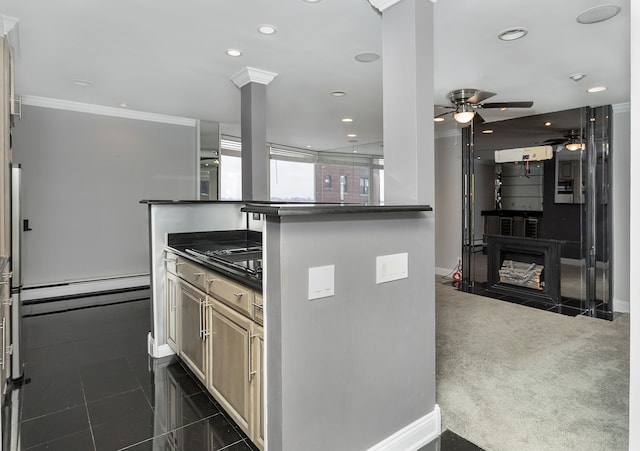 8200 E Jefferson Ave Unit 1811, Detroit, MI 48214 - kitchen with kitchen peninsula, crown molding, a baseboard heating unit, ornate columns, and dark carpet