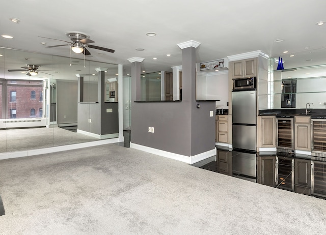 8200 E Jefferson Ave Unit 1811, Detroit, MI 48214 - kitchen featuring wine cooler, dark carpet, a baseboard heating unit, sink, and appliances with stainless steel finishes