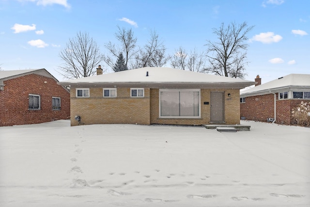 view of snow covered property