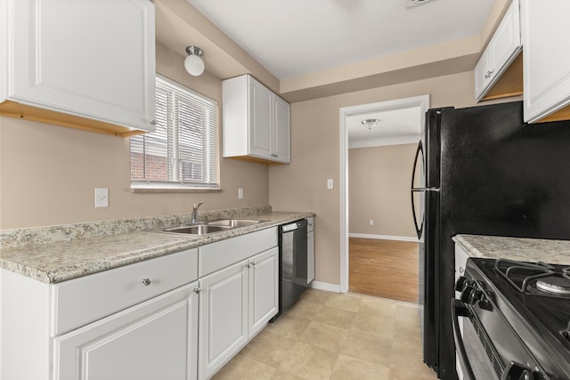 kitchen with sink, white cabinets, and black appliances