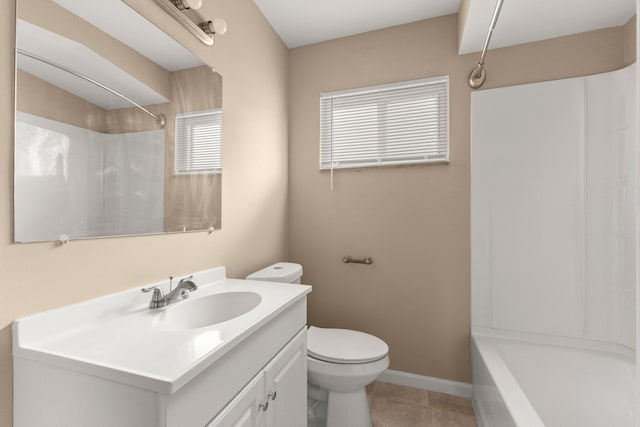 full bathroom featuring toilet, vanity, tile patterned flooring, and shower / bathtub combination