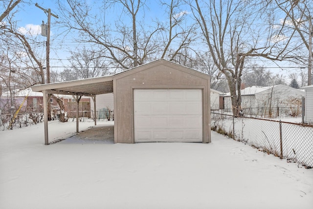 view of snow covered garage