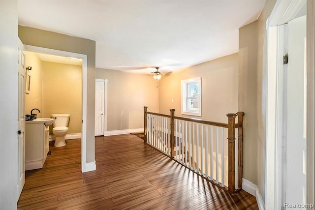 corridor featuring dark hardwood / wood-style flooring