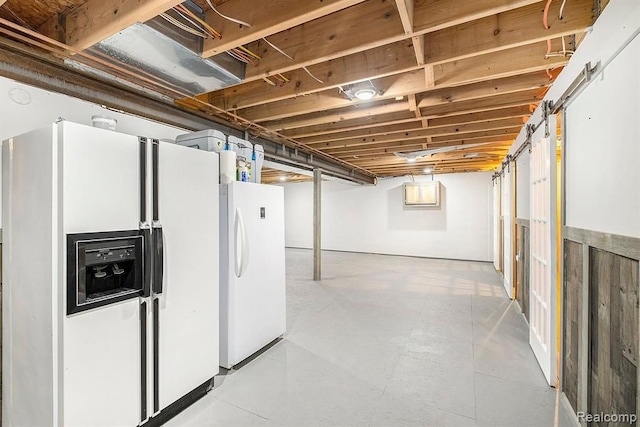 basement with white refrigerator with ice dispenser and white refrigerator