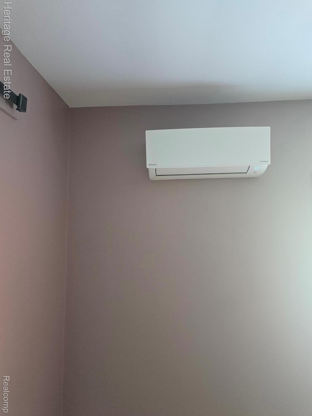 4694 Herd Rd, Metamora, MI 48455 - detailed view of a wall mounted AC