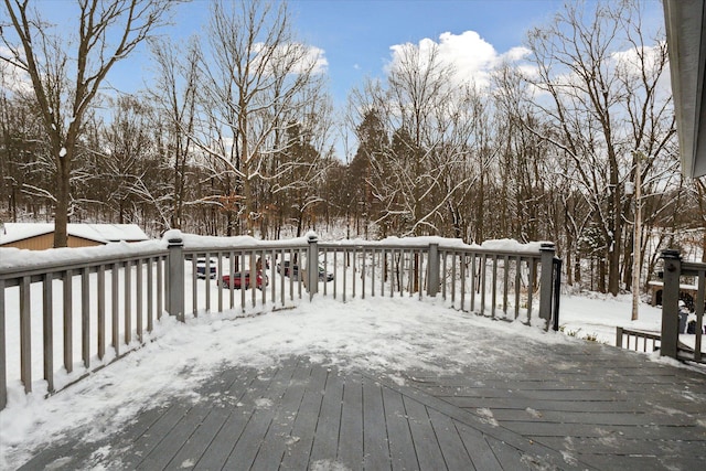 view of snow covered deck