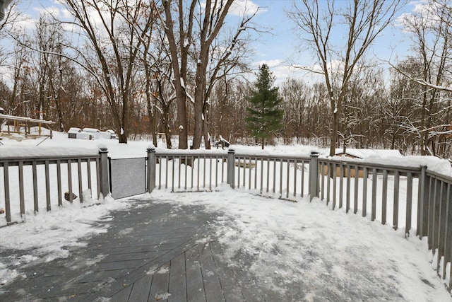 view of snow covered deck