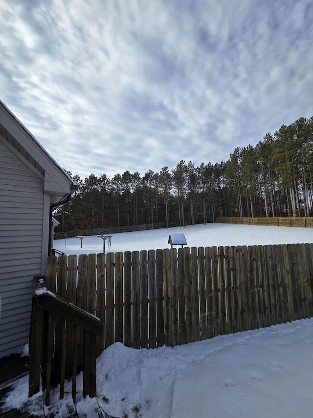 view of snowy yard