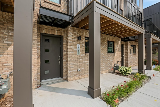 doorway to property with a patio area