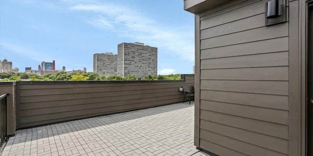 view of patio / terrace with a balcony