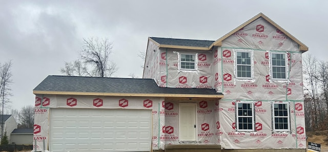 property under construction with a garage and driveway