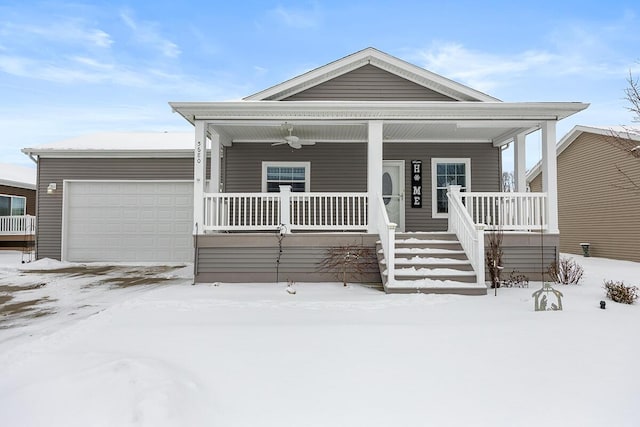 view of front of home featuring ceiling fan, a porch, and a garage