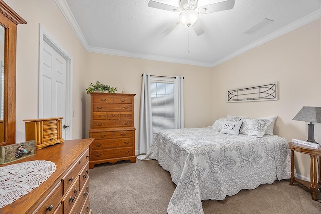 bedroom featuring a textured ceiling, ceiling fan, carpet, and ornamental molding