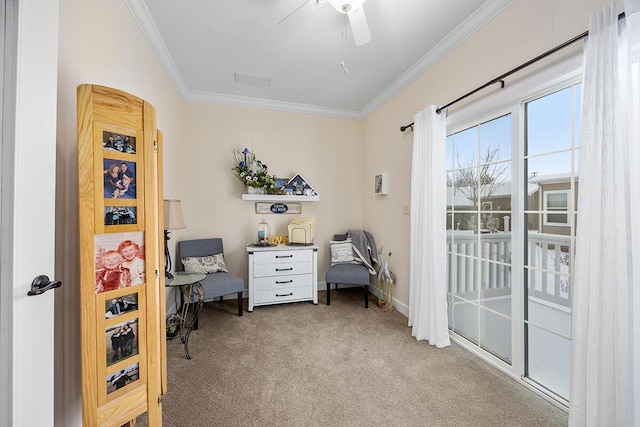 carpeted office space with ceiling fan and crown molding