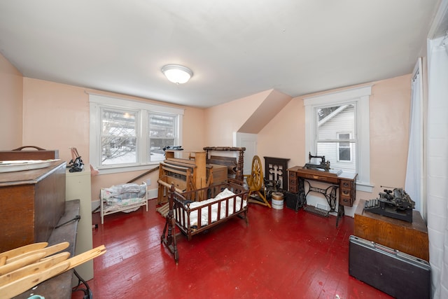 bedroom with dark hardwood / wood-style flooring