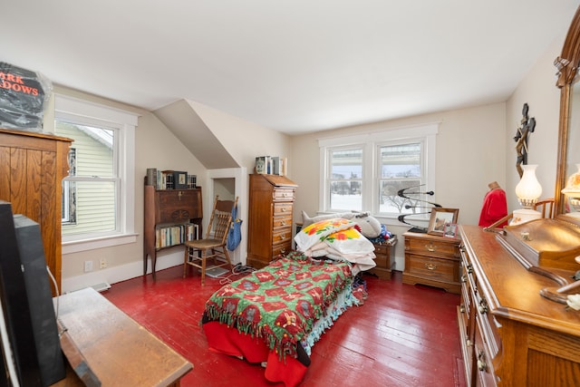 bedroom with dark wood-type flooring