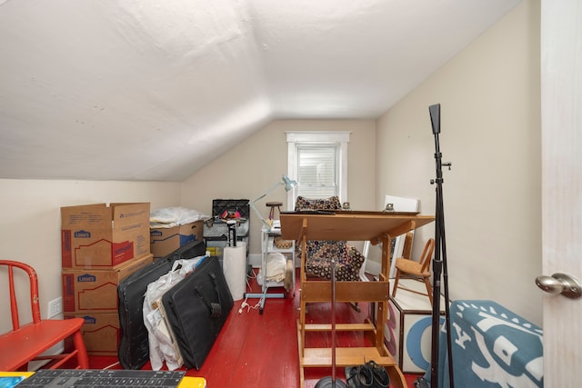 home office with lofted ceiling