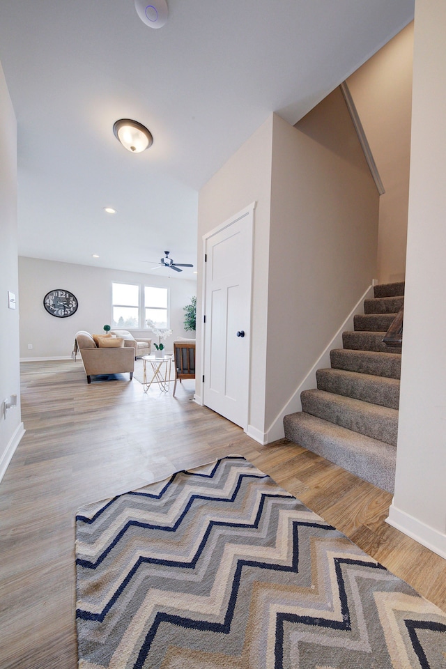 interior space featuring ceiling fan and hardwood / wood-style floors