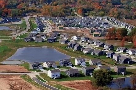 bird's eye view with a water view