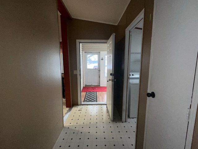 corridor with washer / clothes dryer