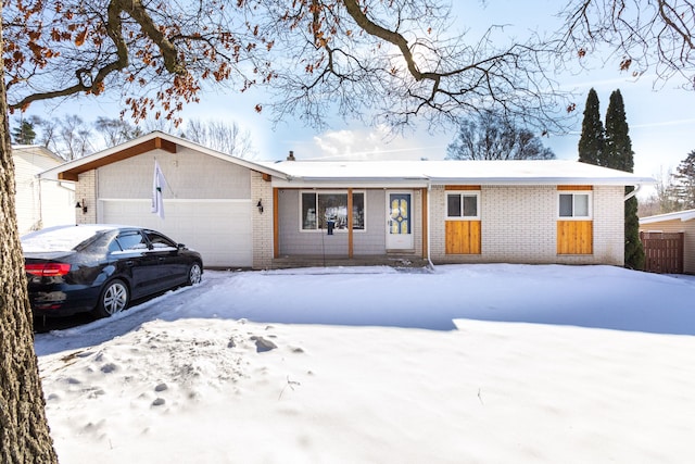 single story home featuring a garage