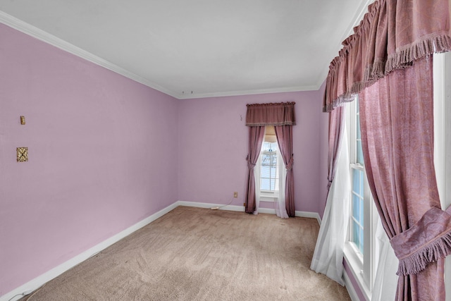 carpeted empty room with ornamental molding