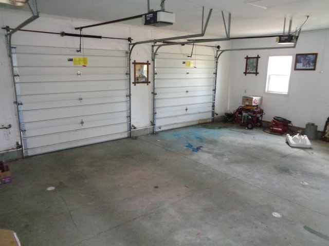 garage featuring a garage door opener