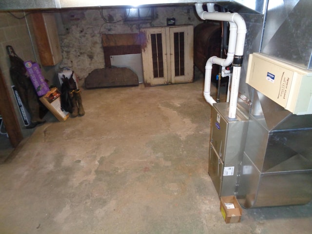 unfinished basement with heating unit