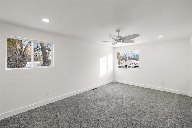 carpeted empty room with ceiling fan