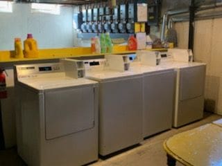 clothes washing area featuring washing machine and clothes dryer