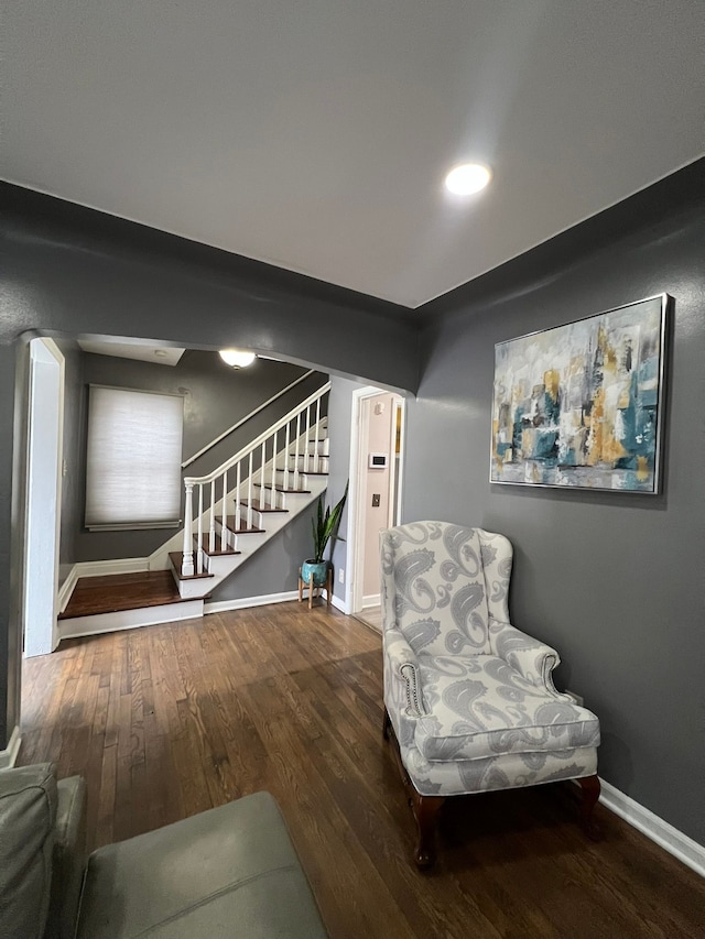 sitting room featuring hardwood / wood-style floors