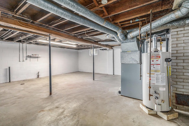 basement featuring heating unit and gas water heater