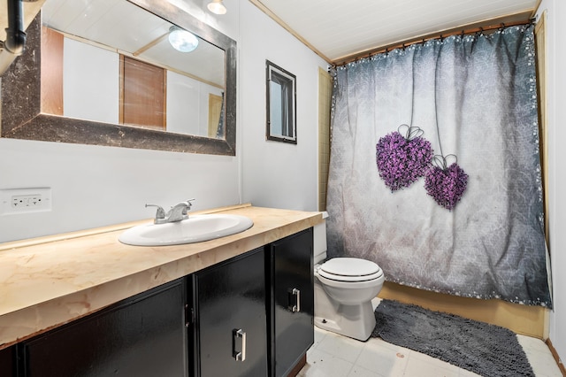 bathroom with toilet, vanity, and a shower with curtain