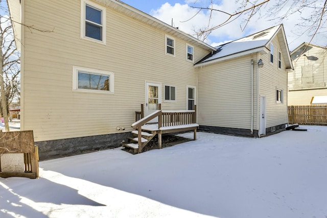 view of snow covered house